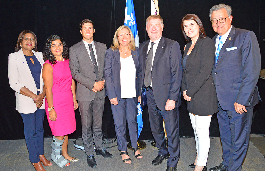 The members of the committee overseeing the FARR subsidies are (from the left) Laval city councillor Jocelyne Frédéric-Gauthier, Councillor Aglaia Revelakis, Councillor Stéphane Boyer, co-president Francine Charbonneau, co-president Mayor Marc Demers, Councillor Sandra Desmeules and Vimont MNA Jean Rouselle.