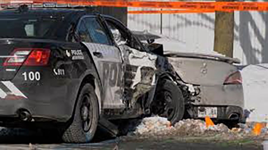 Laval police officers injured after crashing into 4 parked cars